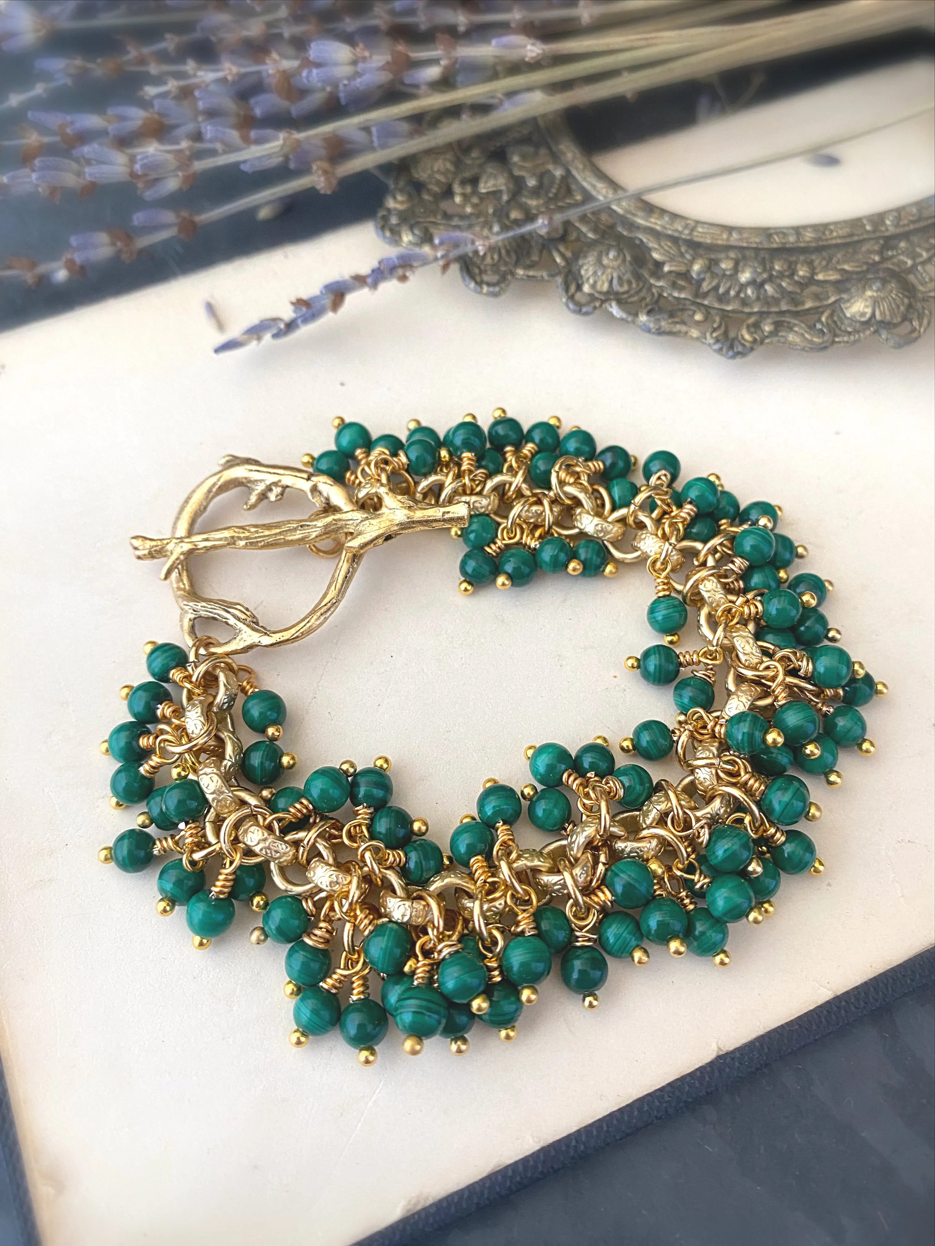 Genuine Green malachite gemstone and gold metal bracelet.