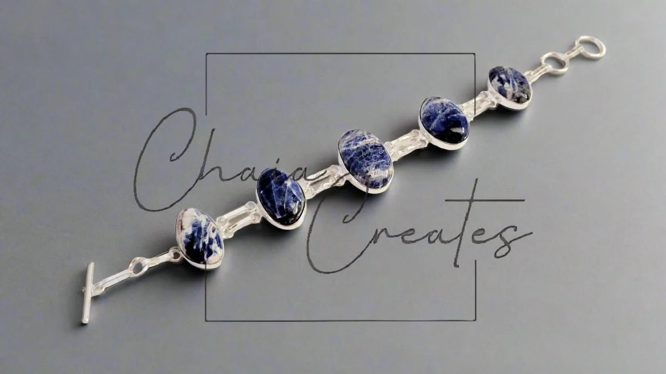 Sodalite Elegance: Handmade Sterling Silver Bracelet with Five Oval Links